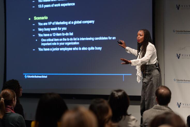 Professor Modupe Akinola delivers a lecture at an industry event